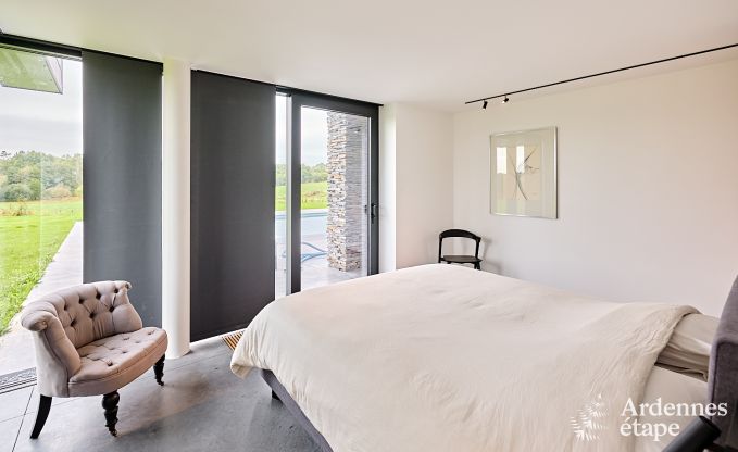 Spacious luxury villa in Bertrix for 16 people with heated outdoor pool and private terrace by the water