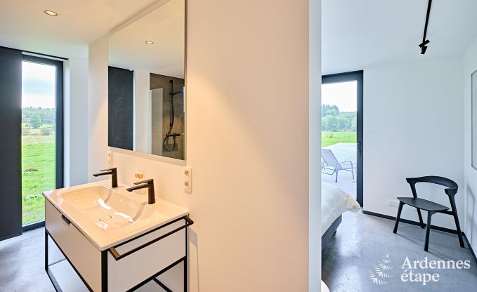 Spacious luxury villa in Bertrix for 16 people with heated outdoor pool and private terrace by the water