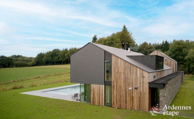 Spacious luxury villa in Bertrix for 16 people with heated outdoor pool and private terrace by the water