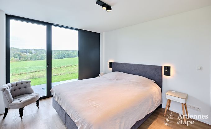 Spacious luxury villa in Bertrix for 16 people with heated outdoor pool and private terrace by the water