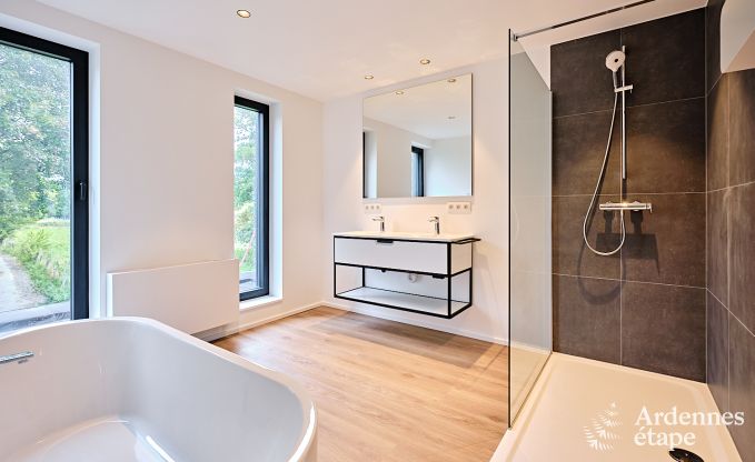 Spacious luxury villa in Bertrix for 16 people with heated outdoor pool and private terrace by the water