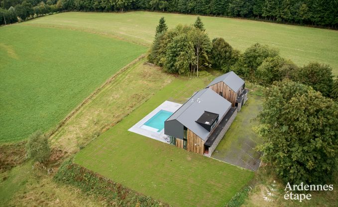 Spacious luxury villa in Bertrix for 16 people with heated outdoor pool and private terrace by the water