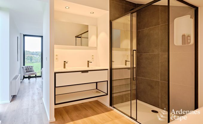 Spacious luxury villa in Bertrix for 16 people with heated outdoor pool and private terrace by the water