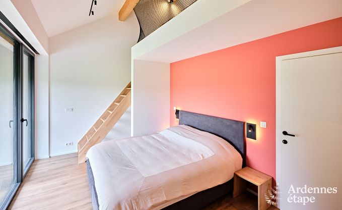 Spacious luxury villa in Bertrix for 16 people with heated outdoor pool and private terrace by the water