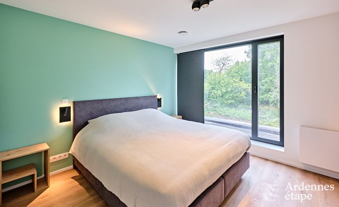 Spacious luxury villa in Bertrix for 16 people with heated outdoor pool and private terrace by the water