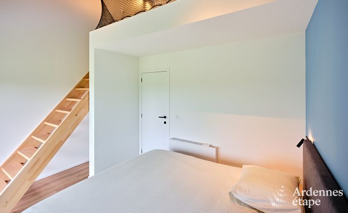 Spacious luxury villa in Bertrix for 16 people with heated outdoor pool and private terrace by the water