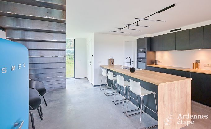 Spacious luxury villa in Bertrix for 16 people with heated outdoor pool and private terrace by the water