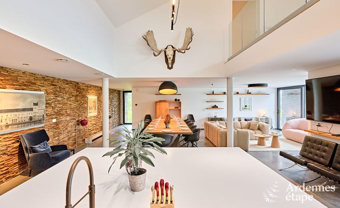 Spacious luxury villa in Bertrix for 16 people with heated outdoor pool and private terrace by the water