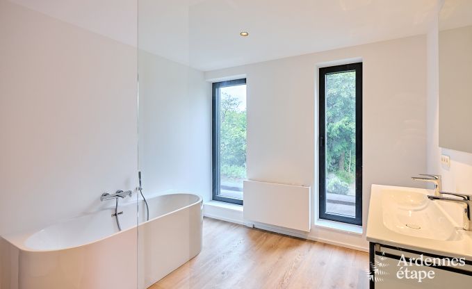 Spacious luxury villa in Bertrix for 16 people with heated outdoor pool and private terrace by the water