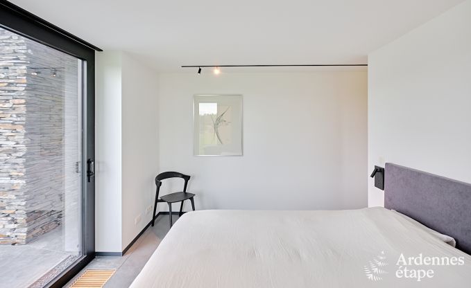 Spacious luxury villa in Bertrix for 16 people with heated outdoor pool and private terrace by the water