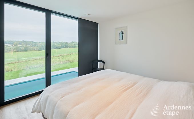 Spacious luxury villa in Bertrix for 16 people with heated outdoor pool and private terrace by the water