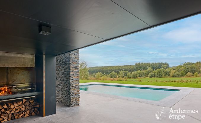 Spacious luxury villa in Bertrix for 16 people with heated outdoor pool and private terrace by the water