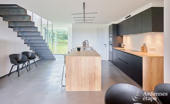 Spacious luxury villa in Bertrix for 16 people with heated outdoor pool and private terrace by the water