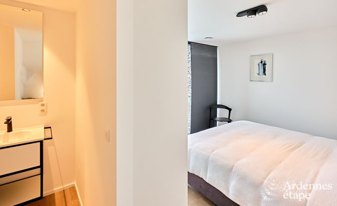 Spacious luxury villa in Bertrix for 16 people with heated outdoor pool and private terrace by the water