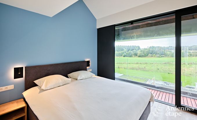 Spacious luxury villa in Bertrix for 16 people with heated outdoor pool and private terrace by the water