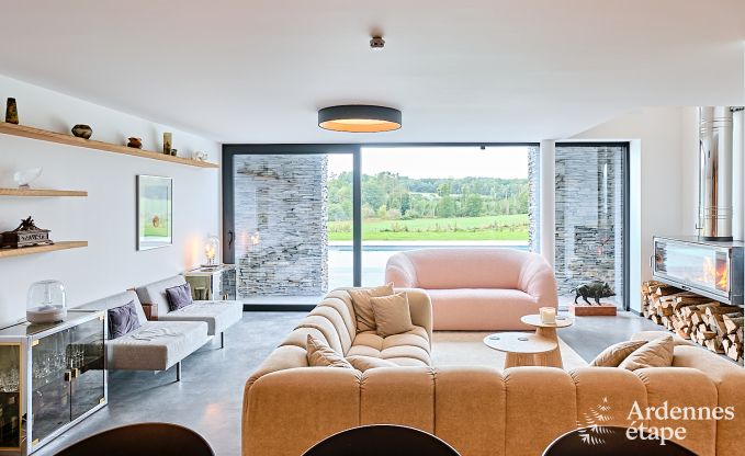 Spacious luxury villa in Bertrix for 16 people with heated outdoor pool and private terrace by the water