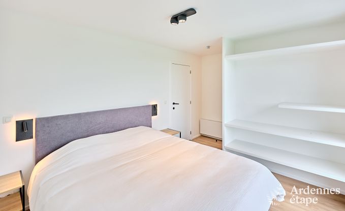 Spacious luxury villa in Bertrix for 16 people with heated outdoor pool and private terrace by the water