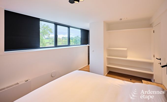 Spacious luxury villa in Bertrix for 16 people with heated outdoor pool and private terrace by the water