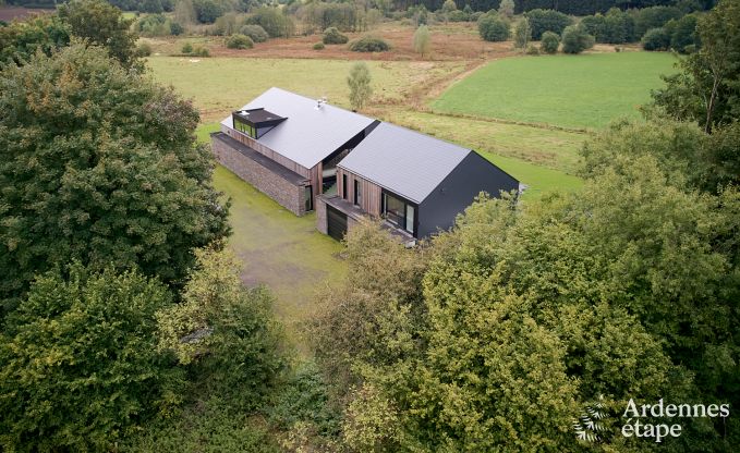 Spacious luxury villa in Bertrix for 16 people with heated outdoor pool and private terrace by the water