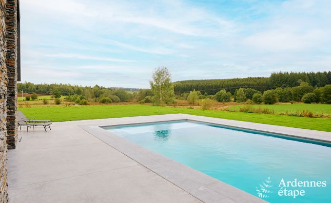 Spacious luxury villa in Bertrix for 16 people with heated outdoor pool and private terrace by the water