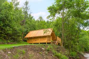 Couples holiday in a cabin to rent in the woods of Houffalize
