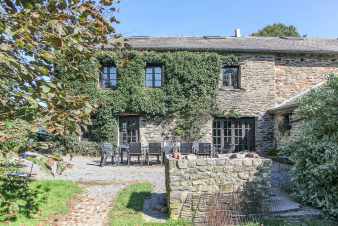 Lovely holiday home with sauna, open fire and a beautiful garden in Houffalize