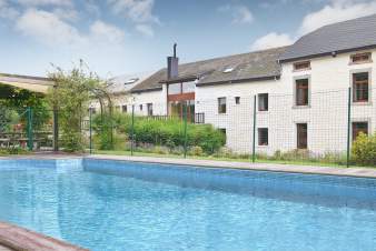 Pretty holiday home for groups with heated pool in Houffalize