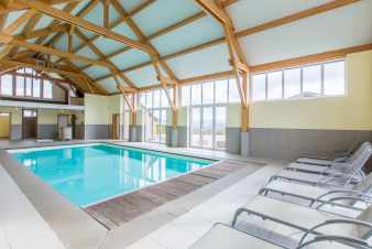 Large rental holiday house with inside pool and games room in La Roche
