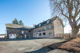 Former hotel for 20 people near Saint-Vith with a large multipurpose room
